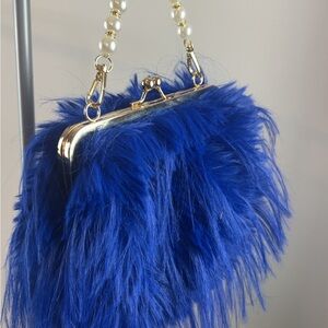 Luxurious Royal Blue Feather Clutch with Pearl Handle